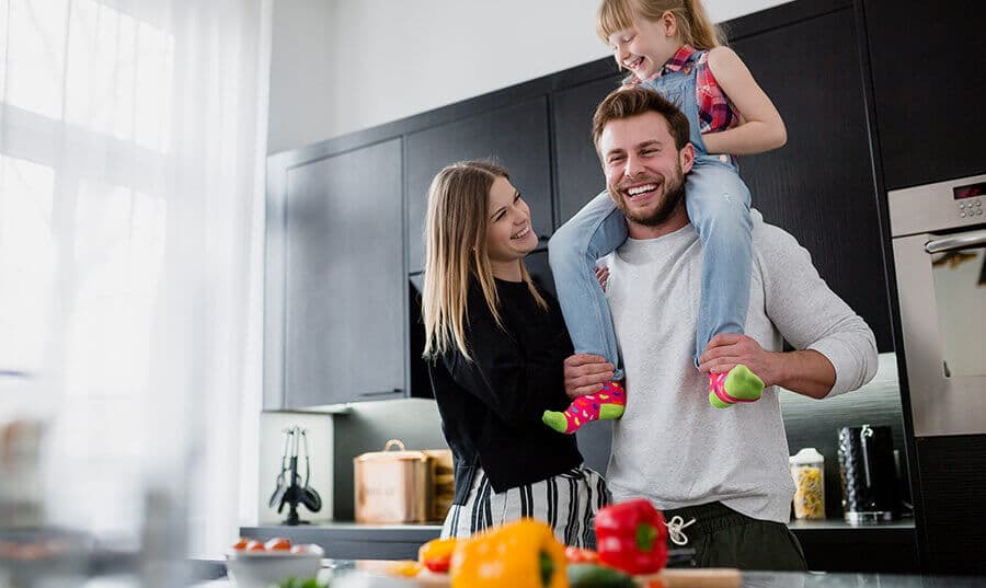 Happy family with new house
